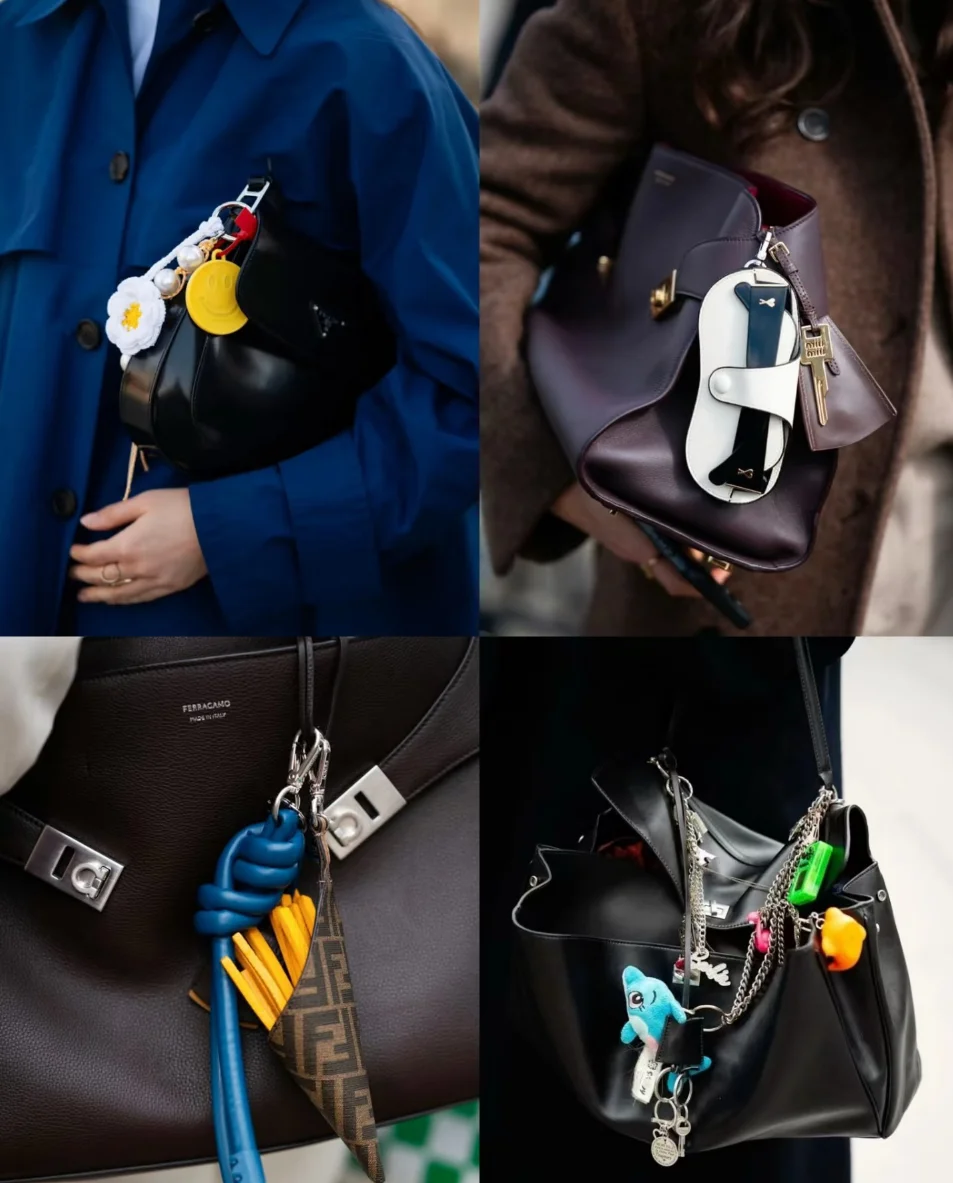 Four handbags with colorful and diverse keychains, showcasing fashionable accessories. Each bag has unique charm styling.