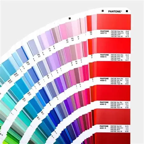 Pantone color swatch fan displaying a gradient of colors ranging from blue, purple to red shades.